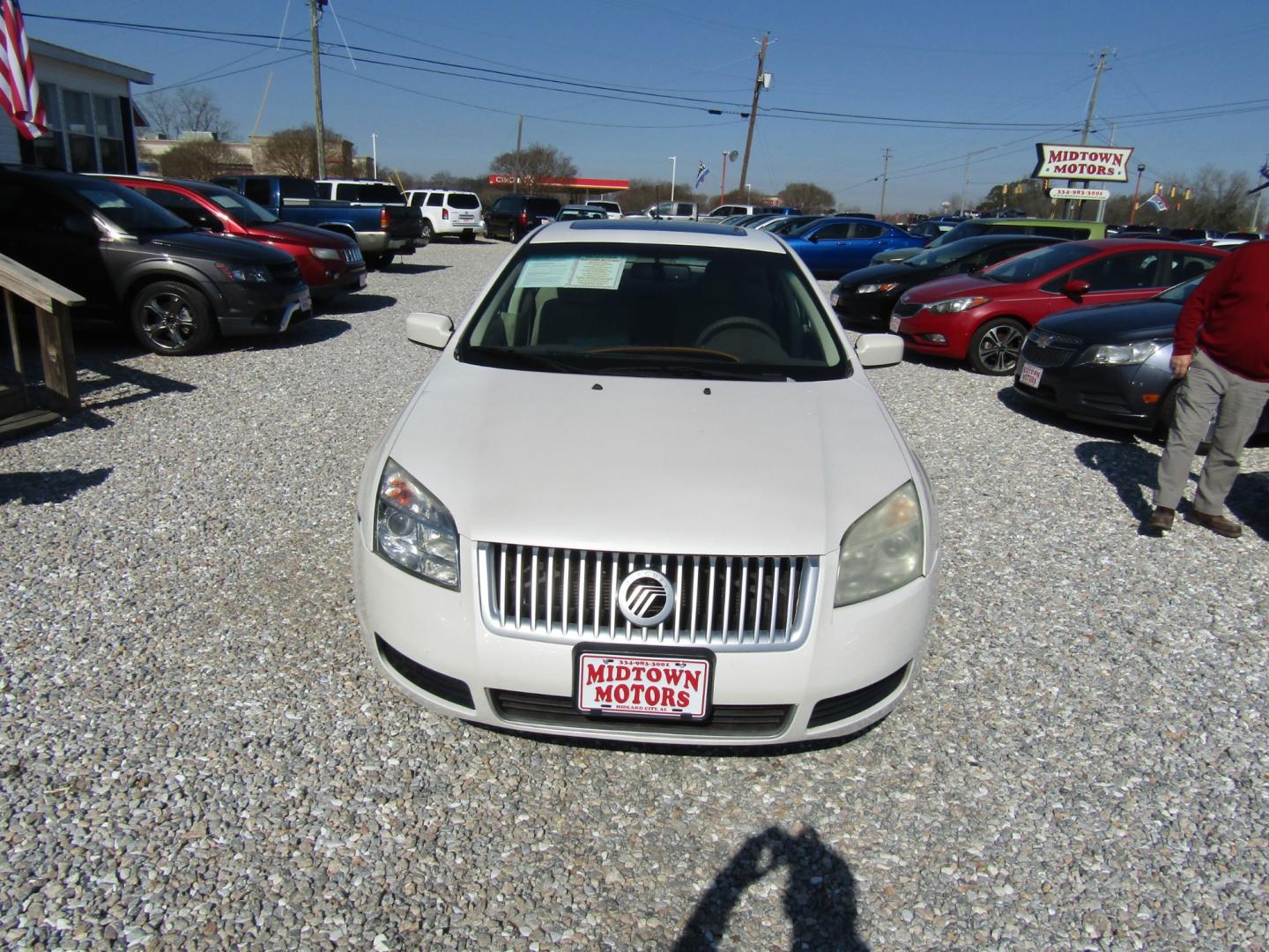 2009 CREAM /Tan Mercury Milan I4 (3MEHM07Z19R) with an 2.3L L4 DOHC 16V engine, Automatic transmission, located at 15016 S Hwy 231, Midland City, AL, 36350, (334) 983-3001, 31.306210, -85.495277 - Photo#1